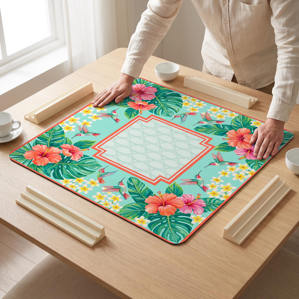 Hibiscus Hummingbird Mahjong Mat — hands unrolling
