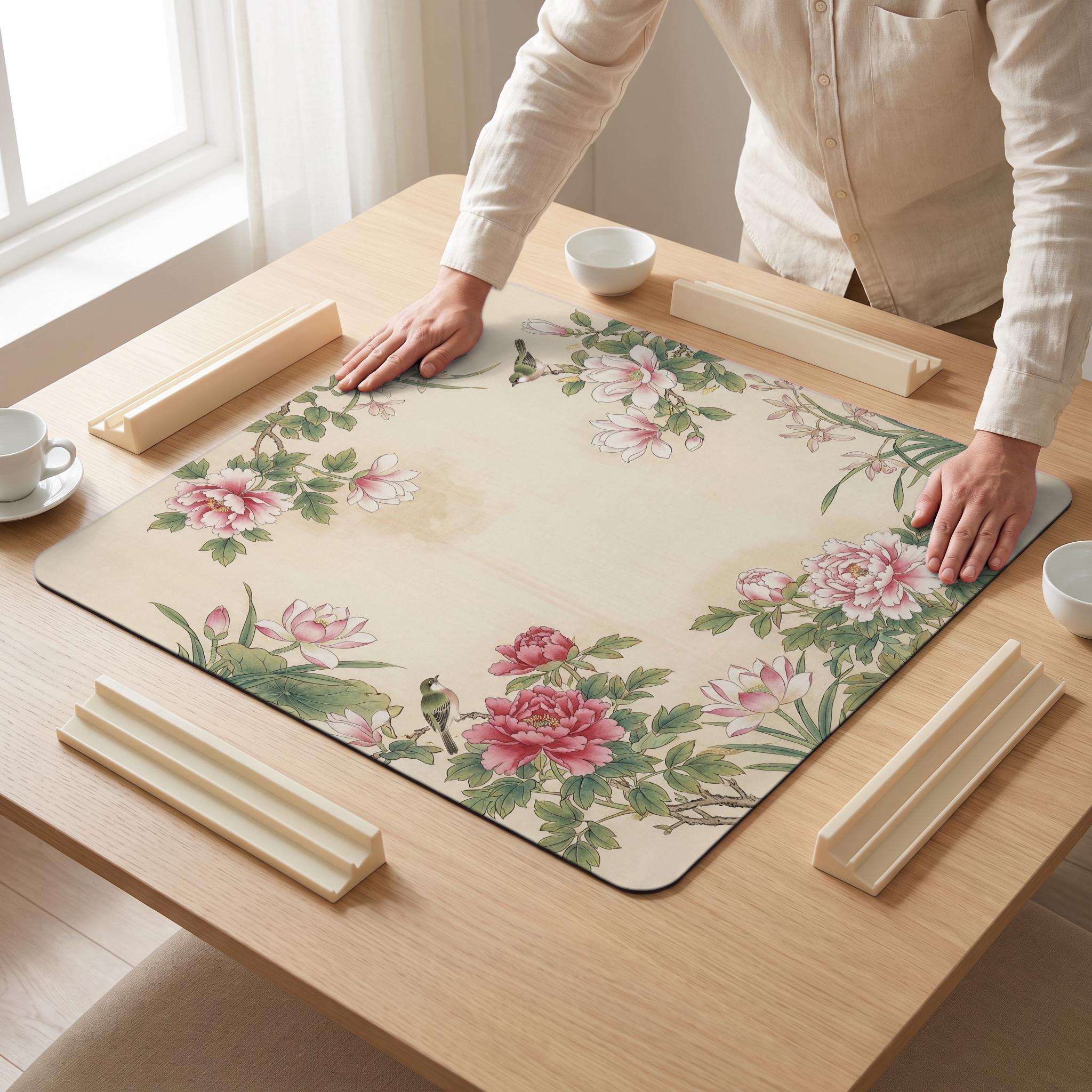 Gongbi Silk Mahjong Mat — hands unrolling