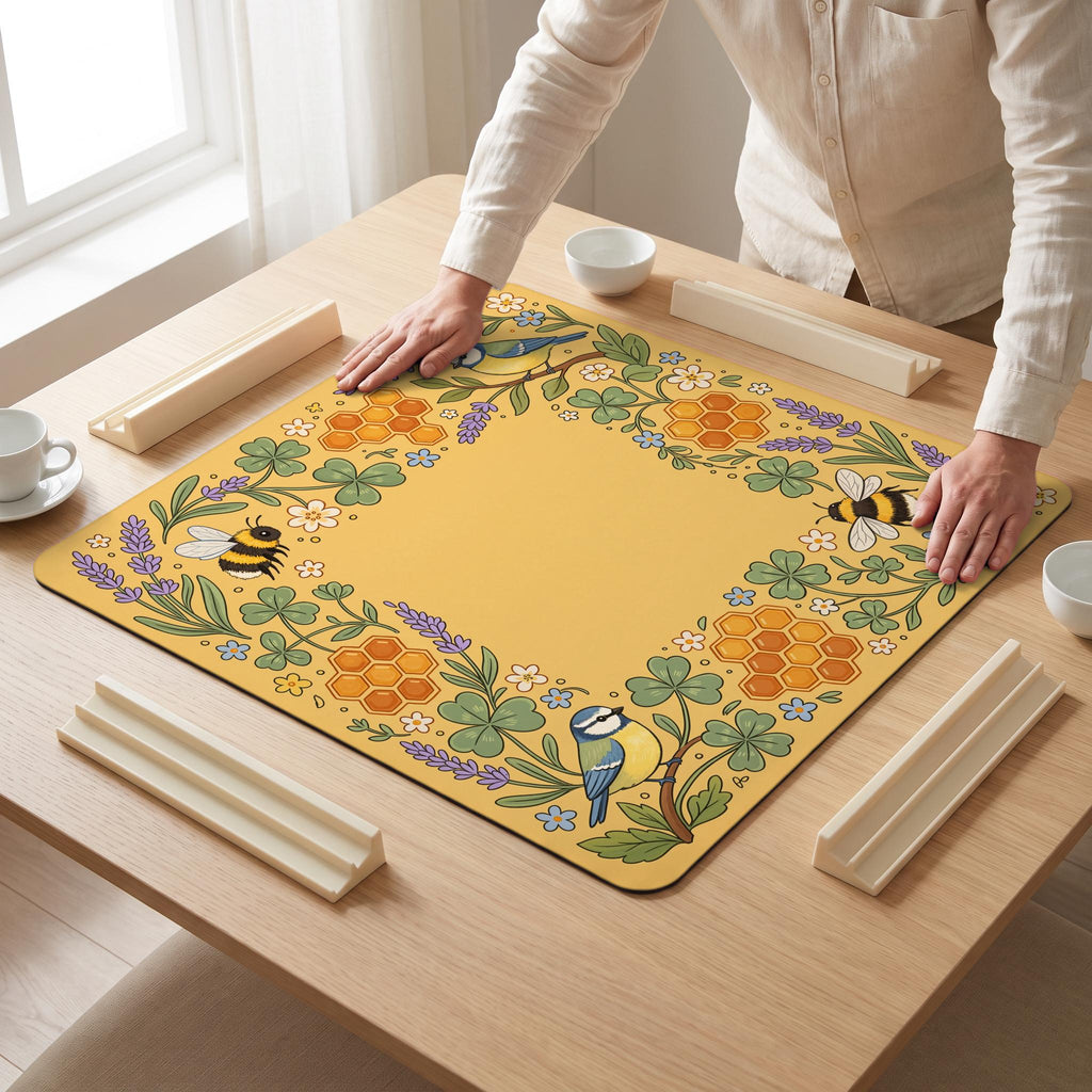 Honeybee Clover Mahjong Mat — hands unrolling