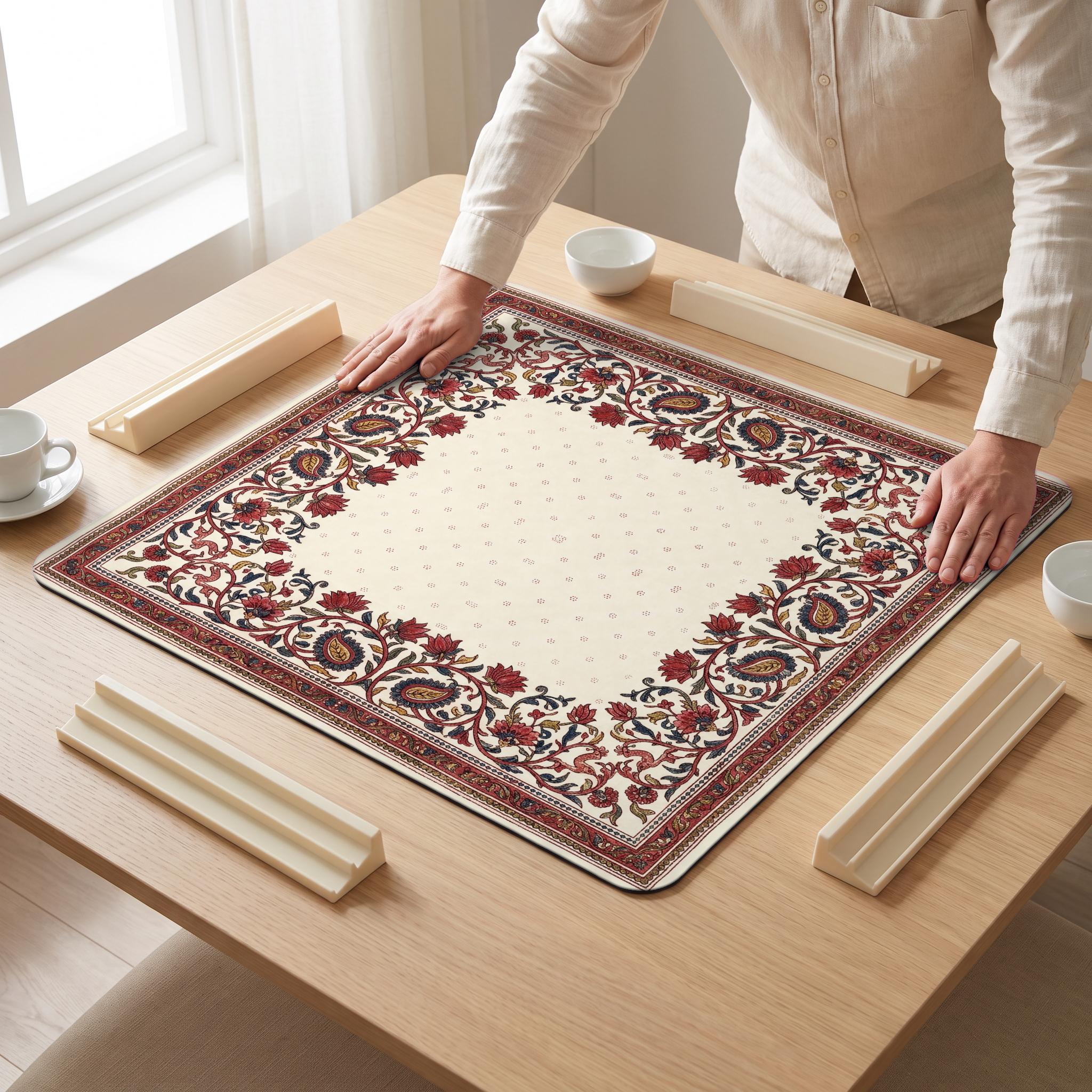 Kalamkari Chintz Mahjong Mat — hands unrolling
