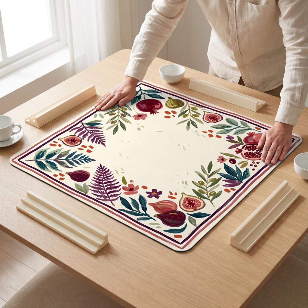 Fig Pomegranate Mahjong Mat — hands unrolling