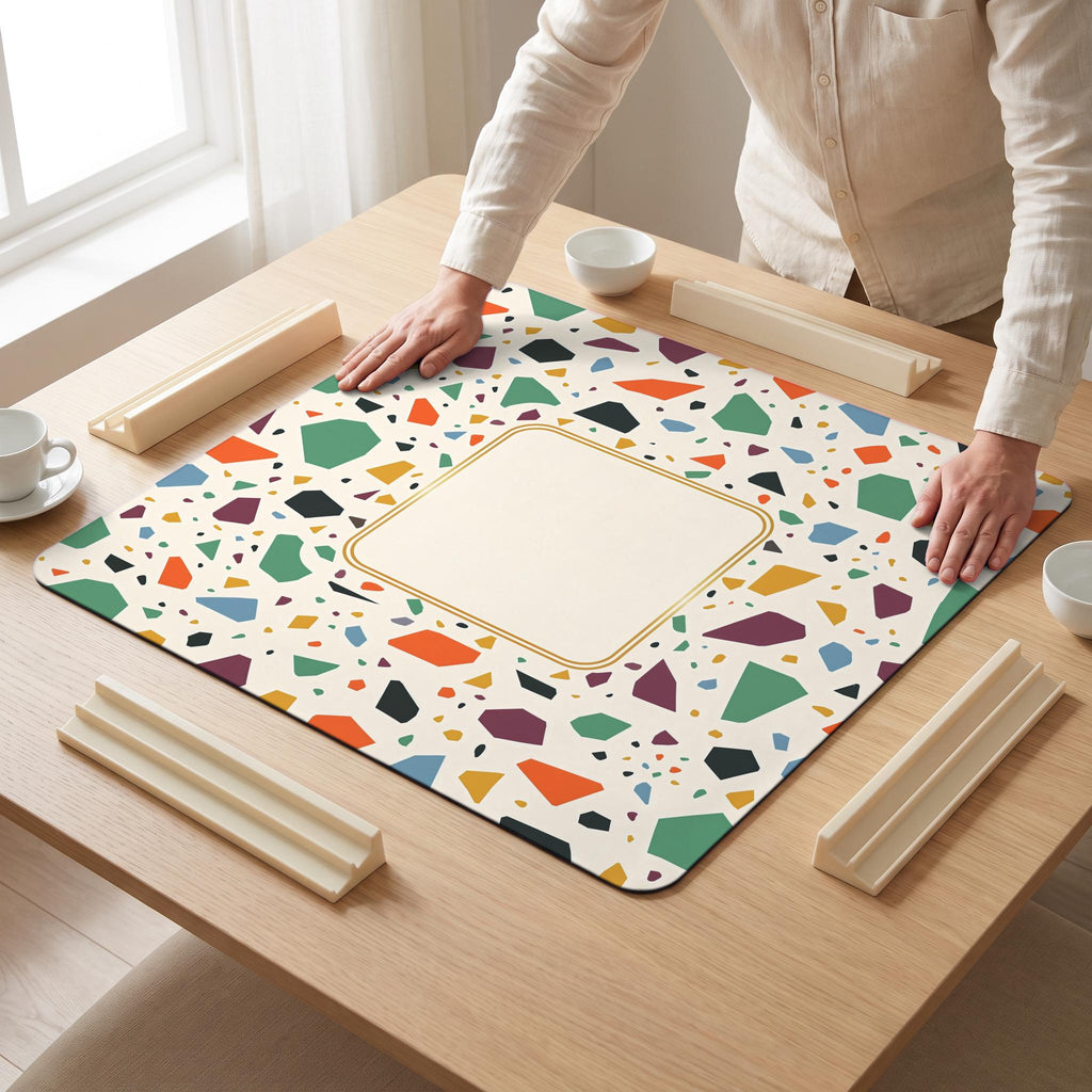 Terrazzo Mahjong Mat — hands unrolling