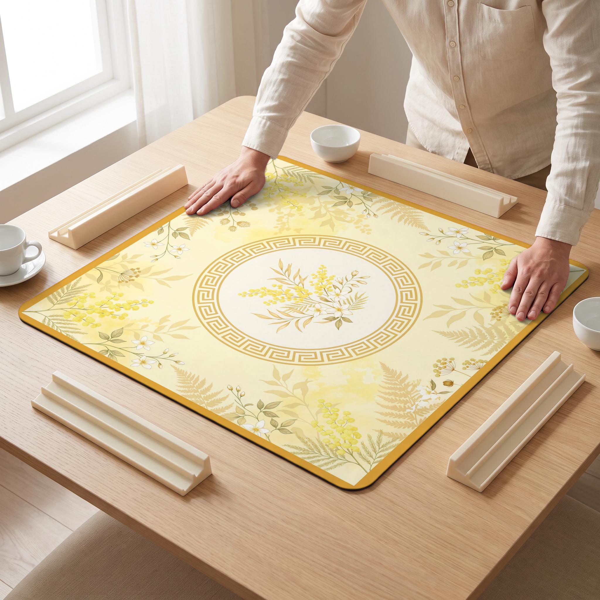 Mimosa Gold Mahjong Mat — hands unrolling