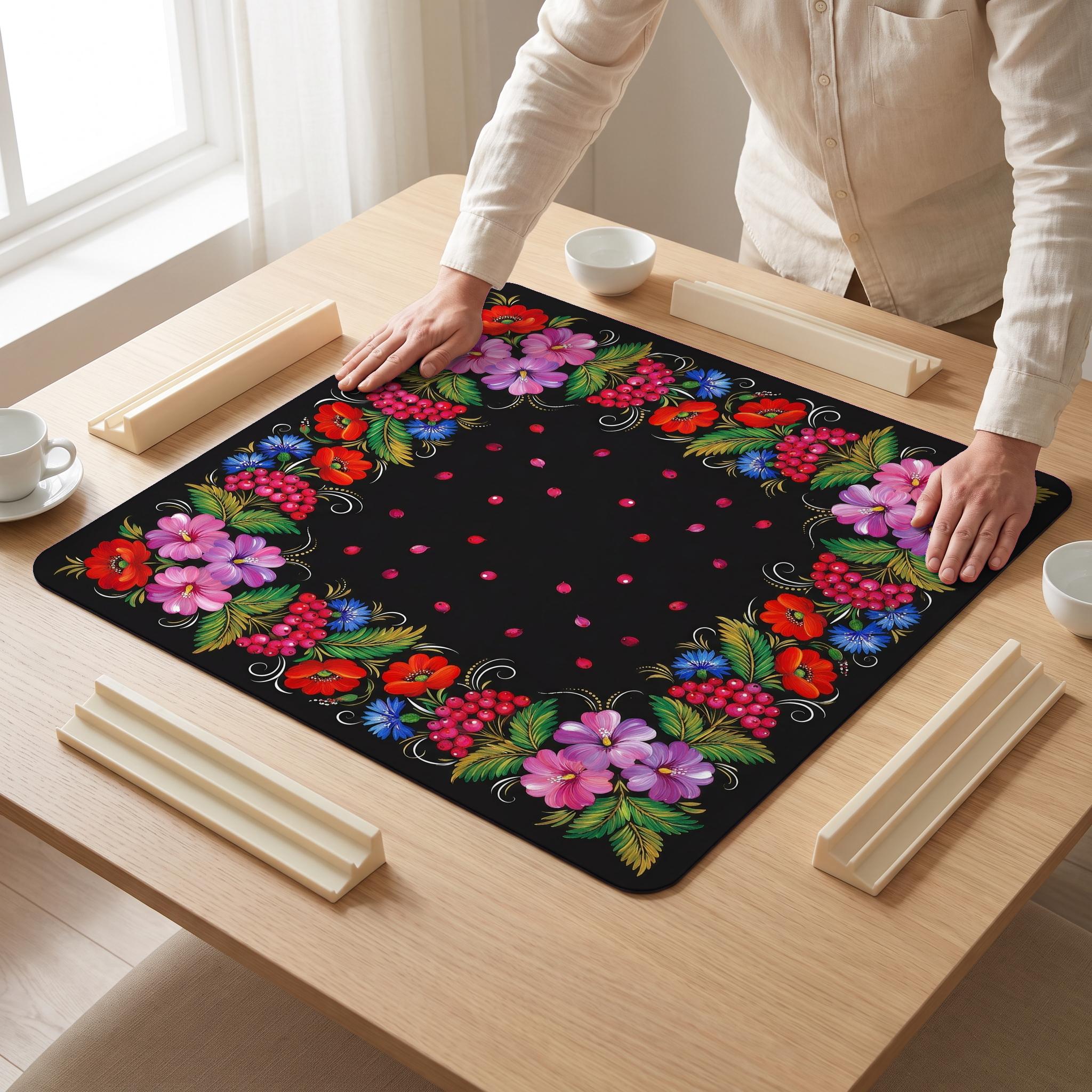 Petrykivka Berry Mahjong Mat — hands unrolling